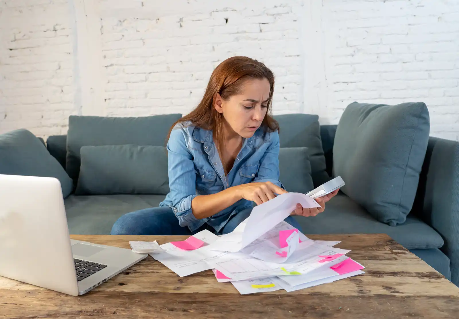 woman looking over paper work with personal injury lawyer